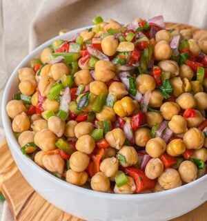 A picture of a roasted red pepper chickpea salad with red wine vinaigrette