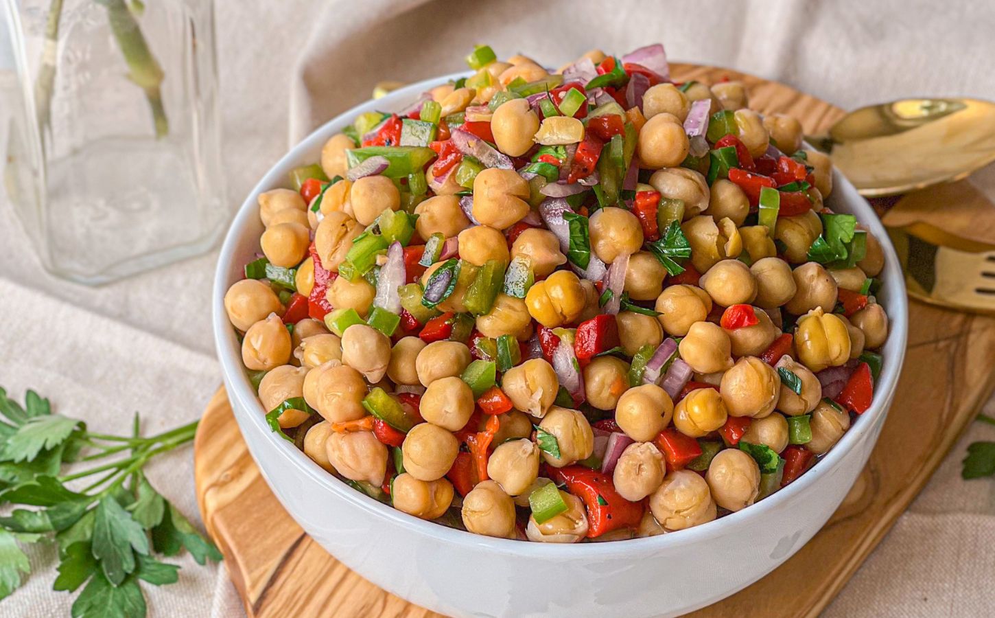 A picture of a roasted red pepper chickpea salad with red wine vinaigrette