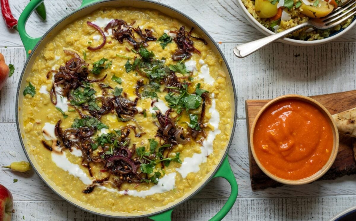 A pot of apple and coconut dahl cooked to a vegan recipe