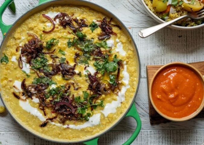 A pot of apple and coconut dahl cooked to a vegan recipe