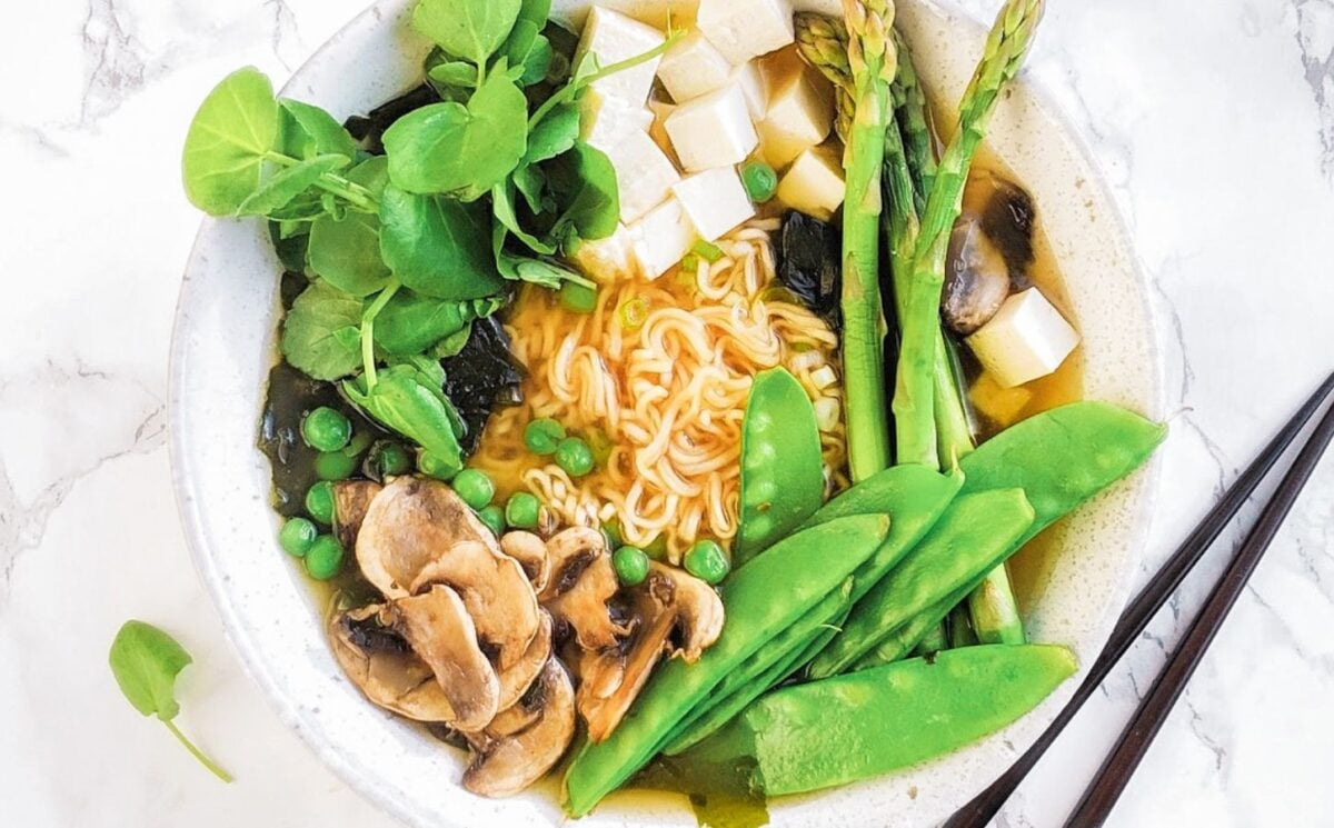 a picture of a spring miso ramen bowl with gluten-free ramen noodles, mushrooms, tofu, and greens