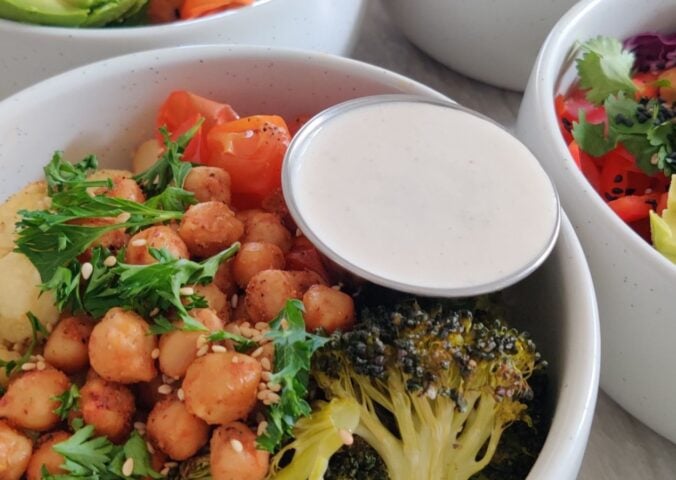 a picture of a gluten-free, high-protein, vegan quinoa power bowl with roasted veggies, quinoa, and chickpeas