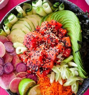 a picture of a vibrant watermelon poke bowl that is vegan