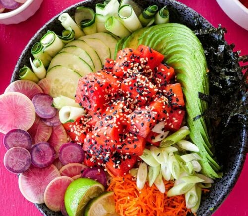 a picture of a vibrant watermelon poke bowl that is vegan