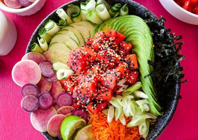 a picture of a vibrant watermelon poke bowl that is vegan