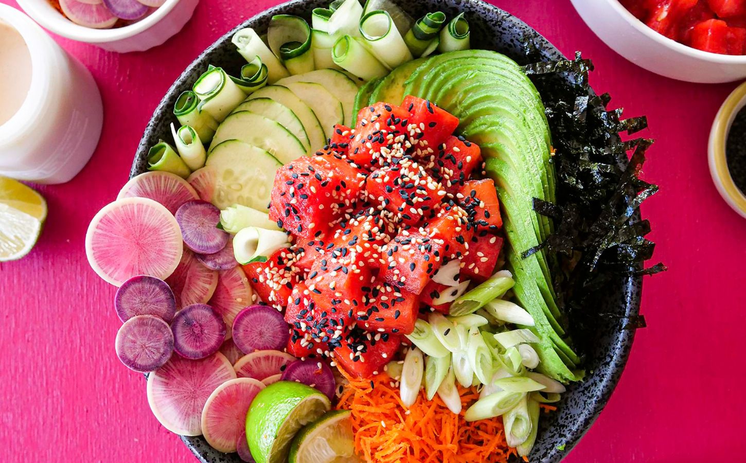 a picture of a vibrant watermelon poke bowl that is vegan