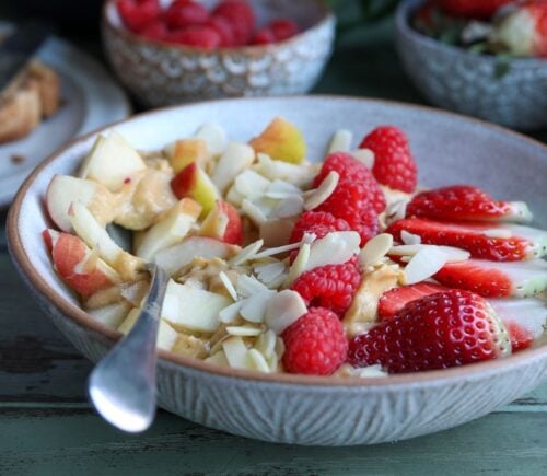 A sweet potato, apple, and berry smoothie bowl made to a plant-based recipe