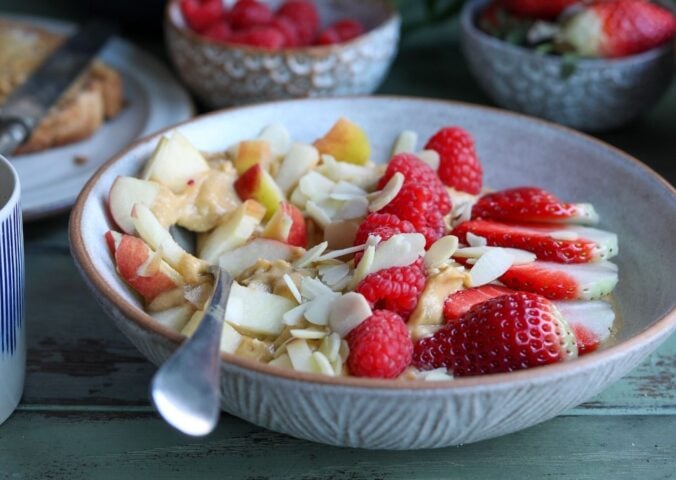 A sweet potato, apple, and berry smoothie bowl made to a plant-based recipe