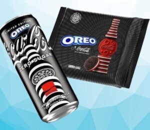 A packet of Coca Cola flavored Oreos in front of a blue background