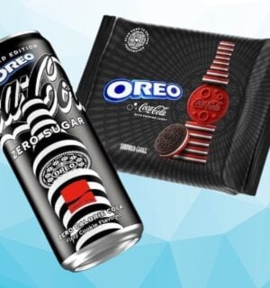 A packet of Coca Cola flavored Oreos in front of a blue background