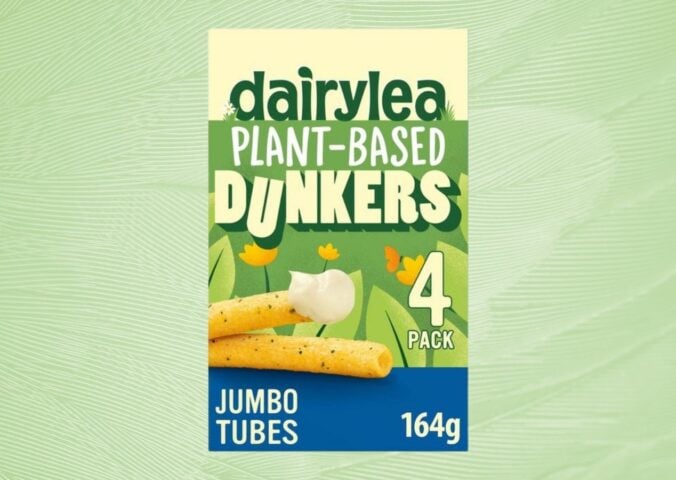 A packet of plant-based Dairylea Dunkers in front of a green background