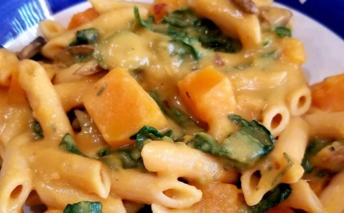 a picture of penne with creamy butternut squash sauce, an ideal addition to fall recipes to warm up your evenings