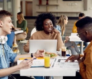 Students eating meat-free meals in a cafeteria