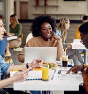 Students eating meat-free meals in a cafeteria