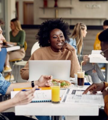 Students eating meat-free meals in a cafeteria