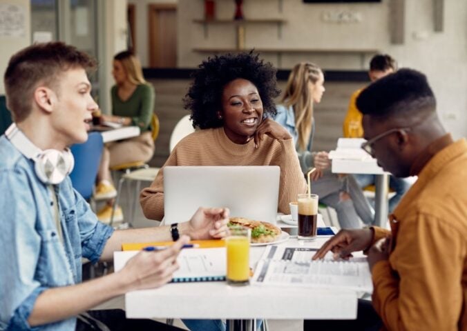 Students eating meat-free meals in a cafeteria