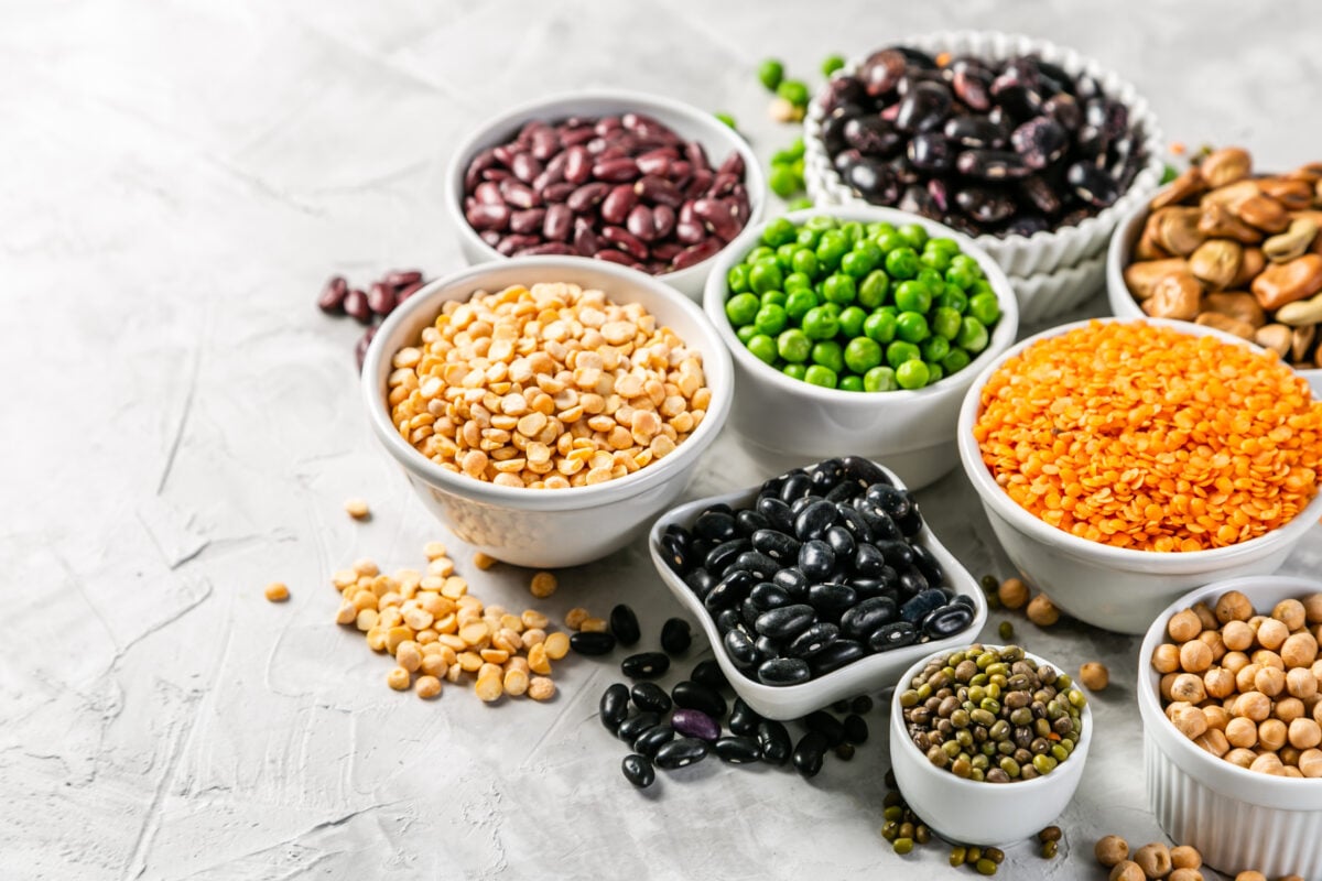 A selection of iron-rich plant foods, including peas and legumes