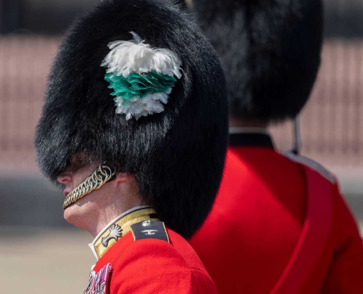 A close up shot of a King's Guard soldier wearing a fur cap made from real bear fur