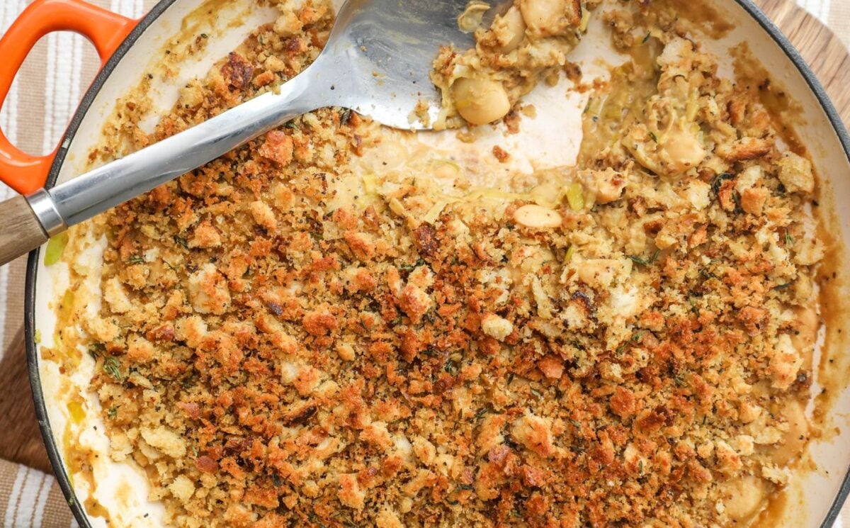 a picture of a miso mustard bean bake made with butter beans and a breadcrumb topping