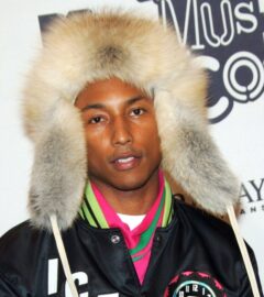 Pharrell Williams - in a hat made from real mink fur - on the red carpet