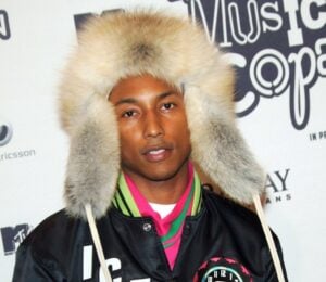 Pharrell Williams - in a hat made from real mink fur - on the red carpet