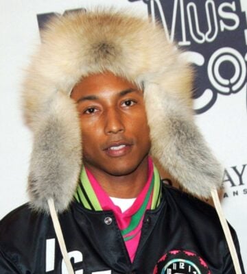 Pharrell Williams - in a hat made from real mink fur - on the red carpet