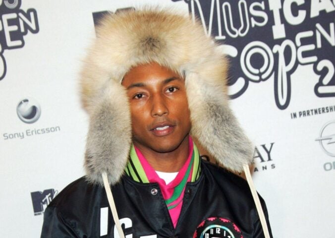 Pharrell Williams - in a hat made from real mink fur - on the red carpet