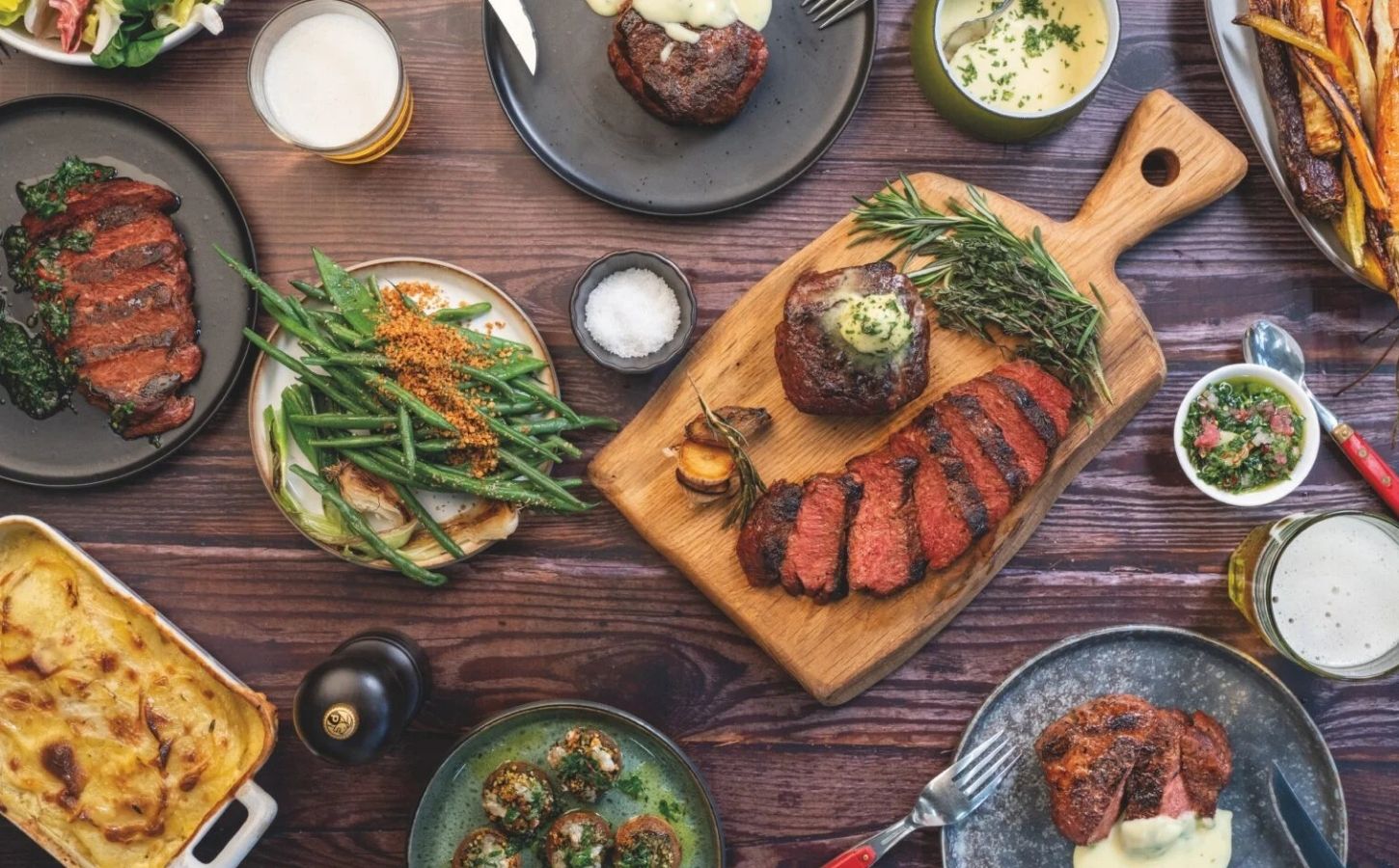 Photo shows a selection of dishes made with the Planted vegan steak