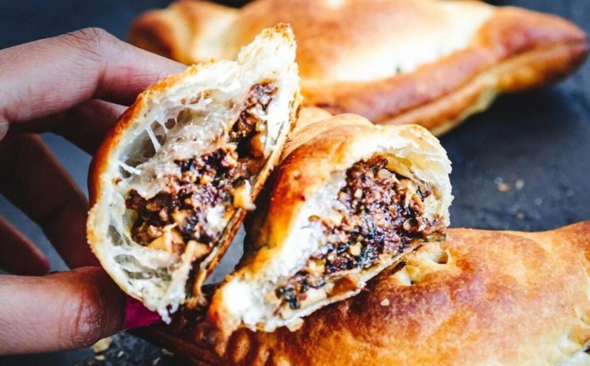 a picture of small mushroom puff pies made with spinach and garlic