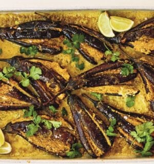 a picture of sesame aubergine curry made with peanuts, sesame, curry powder, and lime