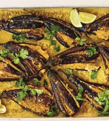 a picture of sesame aubergine curry made with peanuts, sesame, curry powder, and lime