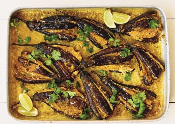 a picture of sesame aubergine curry made with peanuts, sesame, curry powder, and lime