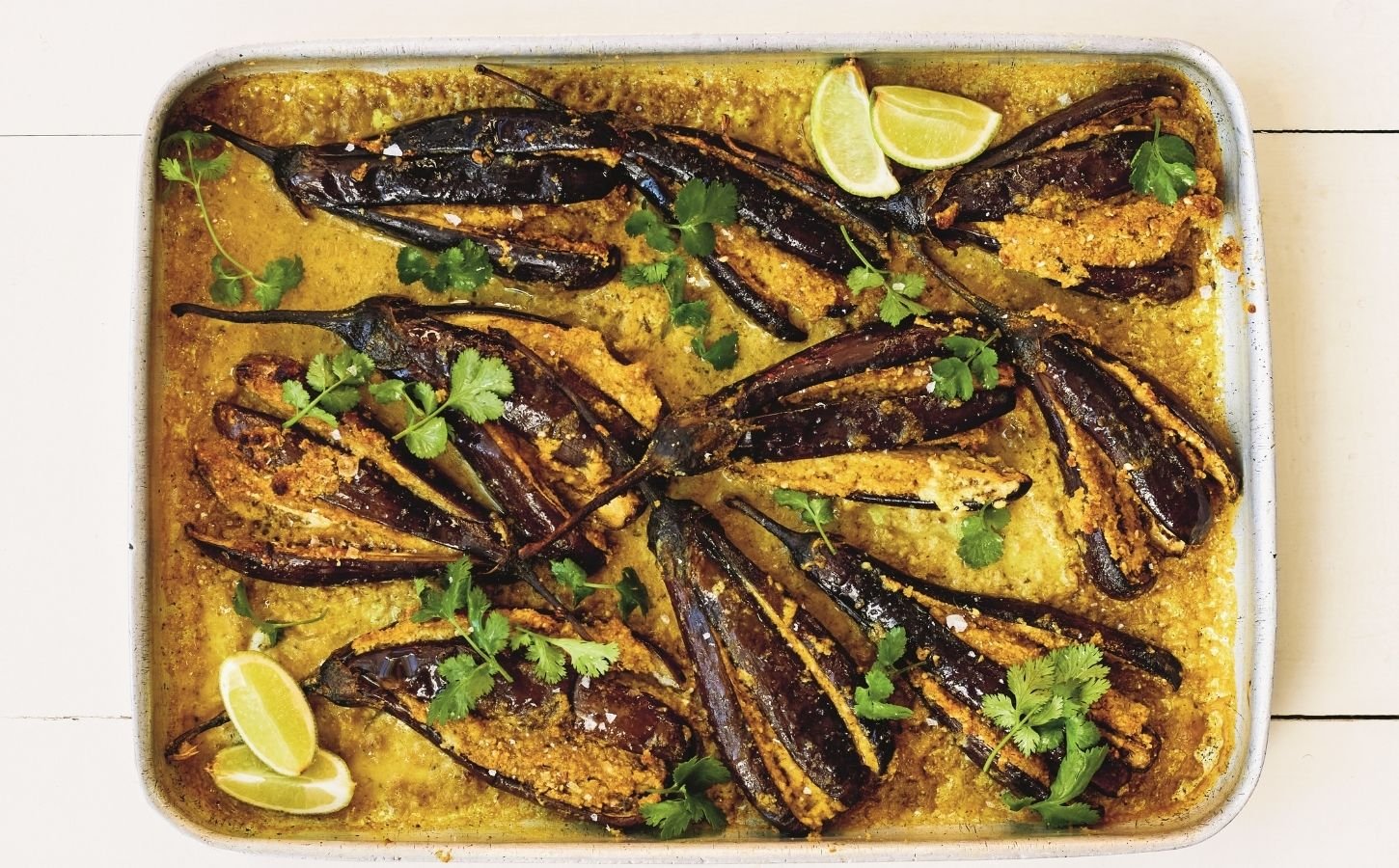 a picture of sesame aubergine curry made with peanuts, sesame, curry powder, and lime