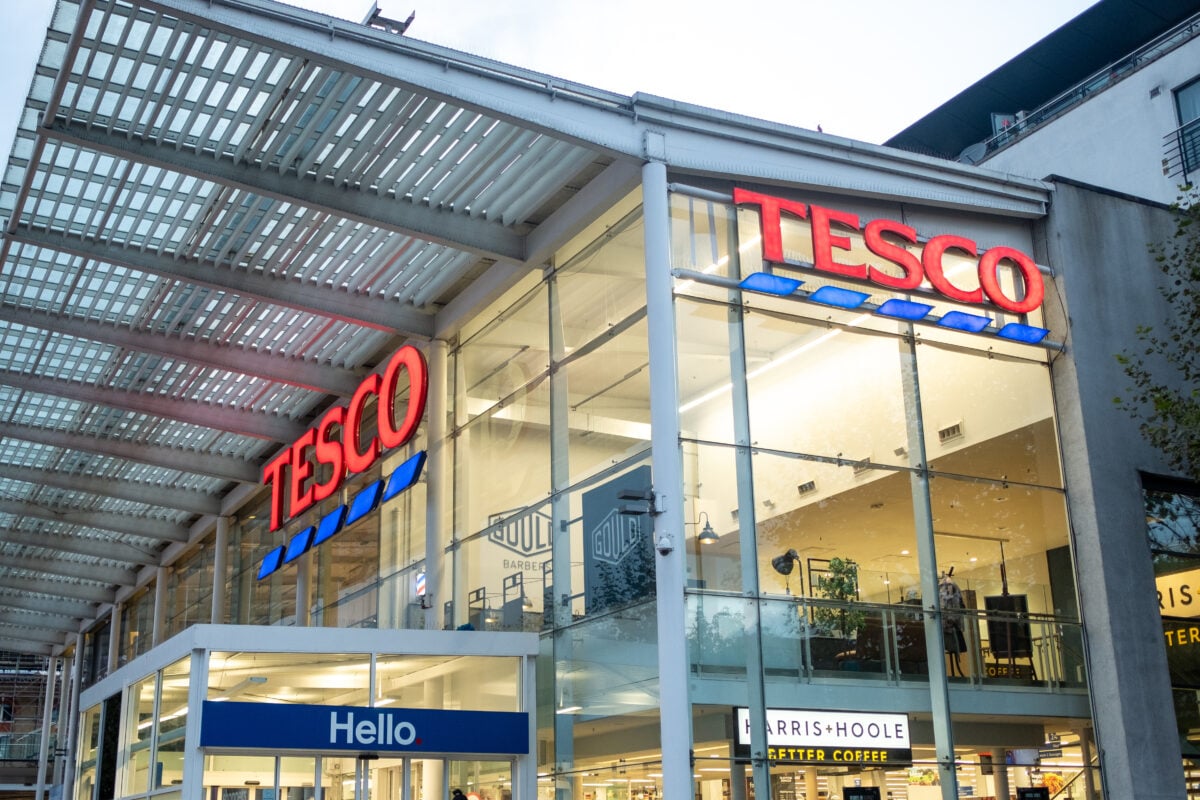 The outside of UK supermarket Tesco, which has just dropped plastic lids from hummus