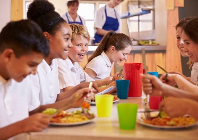 Children eating at a school cafeteria