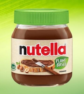 A product image of Nutella Plant-Based in front of a green background