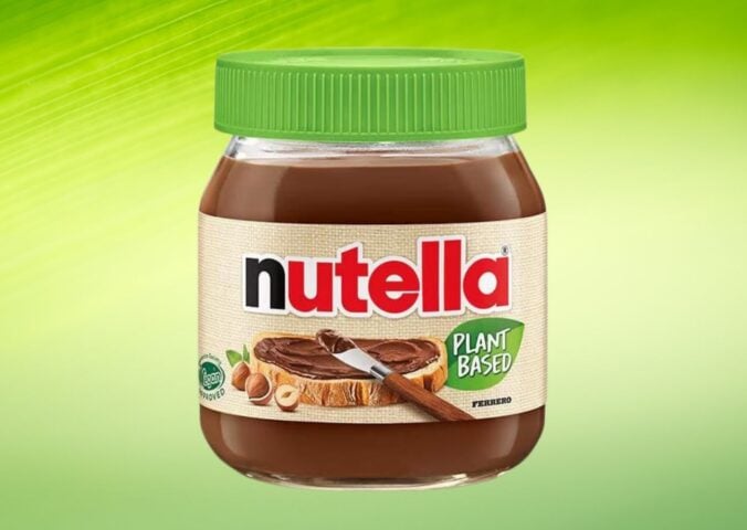 A product image of Nutella Plant-Based in front of a green background