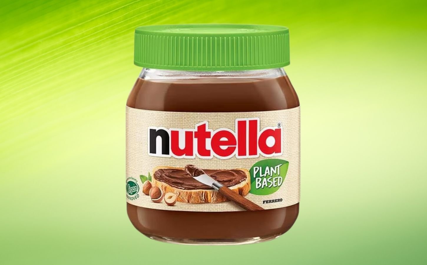 A product image of Nutella Plant-Based in front of a green background