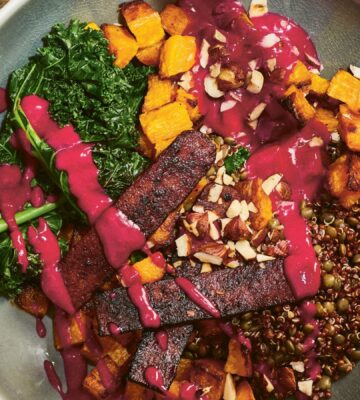a picture of an autumn everything bowl with yogurt beet sauce