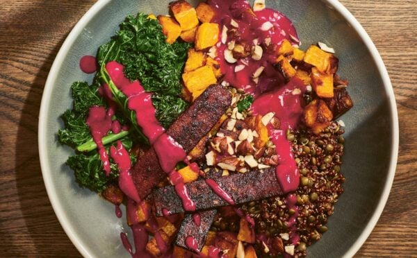 a picture of an autumn everything bowl with yogurt beet sauce