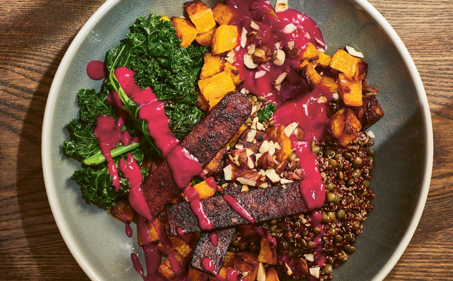 a picture of an autumn everything bowl with yogurt beet sauce