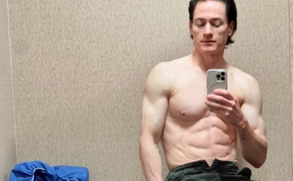 Longevity expert Bryan Johnson taking a topless mirror selfie