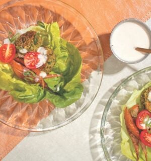 a picture of falafel-pear lettuce wraps with cumin pears, garlic tahini, chickpea and fava bean falafel, and butter lettuce