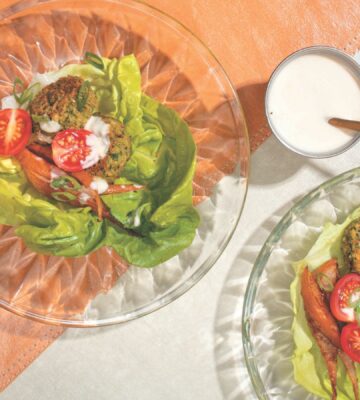 a picture of falafel-pear lettuce wraps with cumin pears, garlic tahini, chickpea and fava bean falafel, and butter lettuce