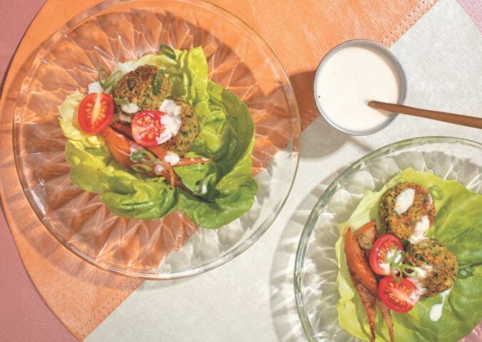 a picture of falafel-pear lettuce wraps with cumin pears, garlic tahini, chickpea and fava bean falafel, and butter lettuce