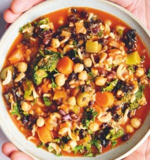 an Ikarian longevity stew filled with beans, chickpeas, lentils, kale, broccoli