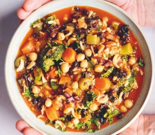 an Ikarian longevity stew filled with beans, chickpeas, lentils, kale, broccoli