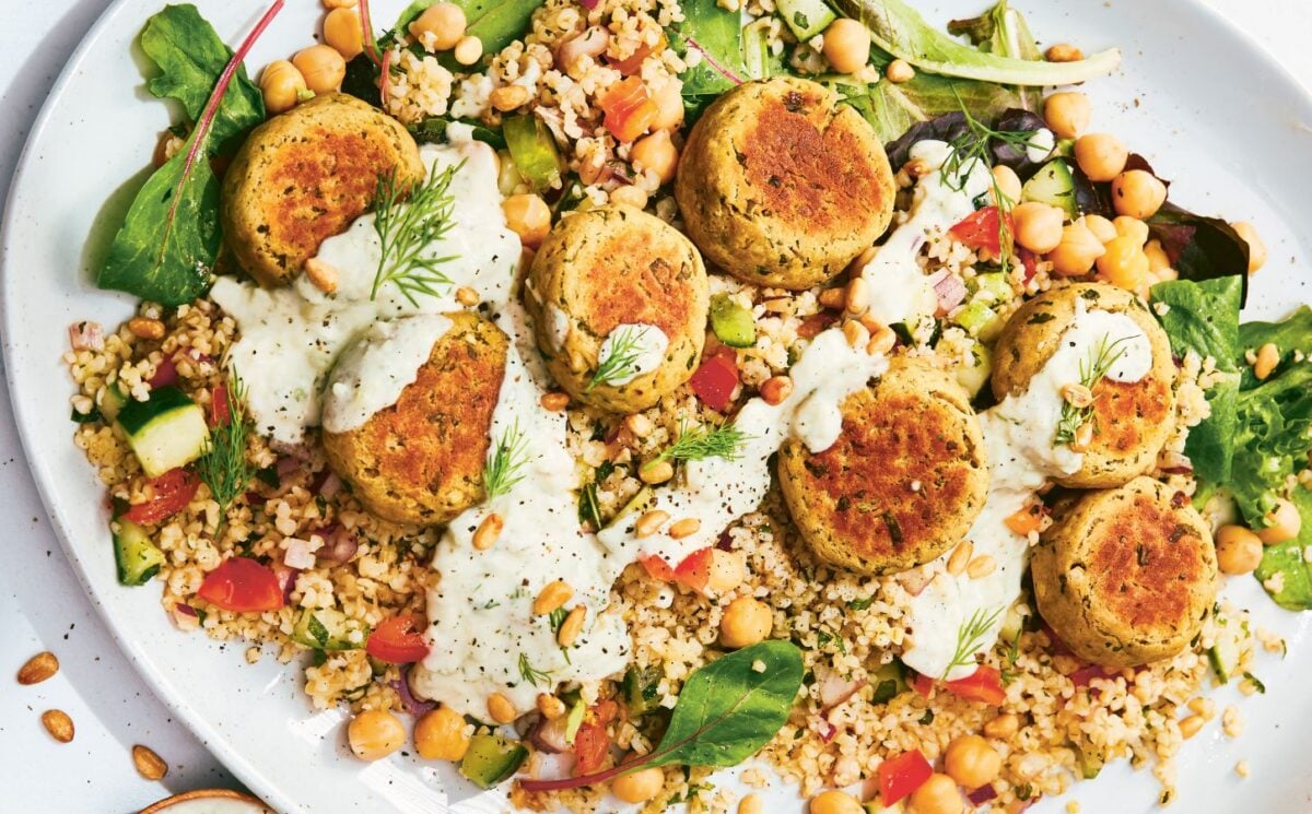 a picture of a vegan falafel and tabbouleh dish paired with tzatziki and loose greens