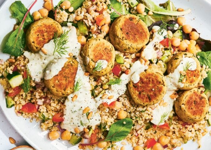 a picture of a vegan falafel and tabbouleh dish paired with tzatziki and loose greens