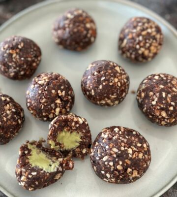 A plate of pistachio energy balls made to a vegan recipe